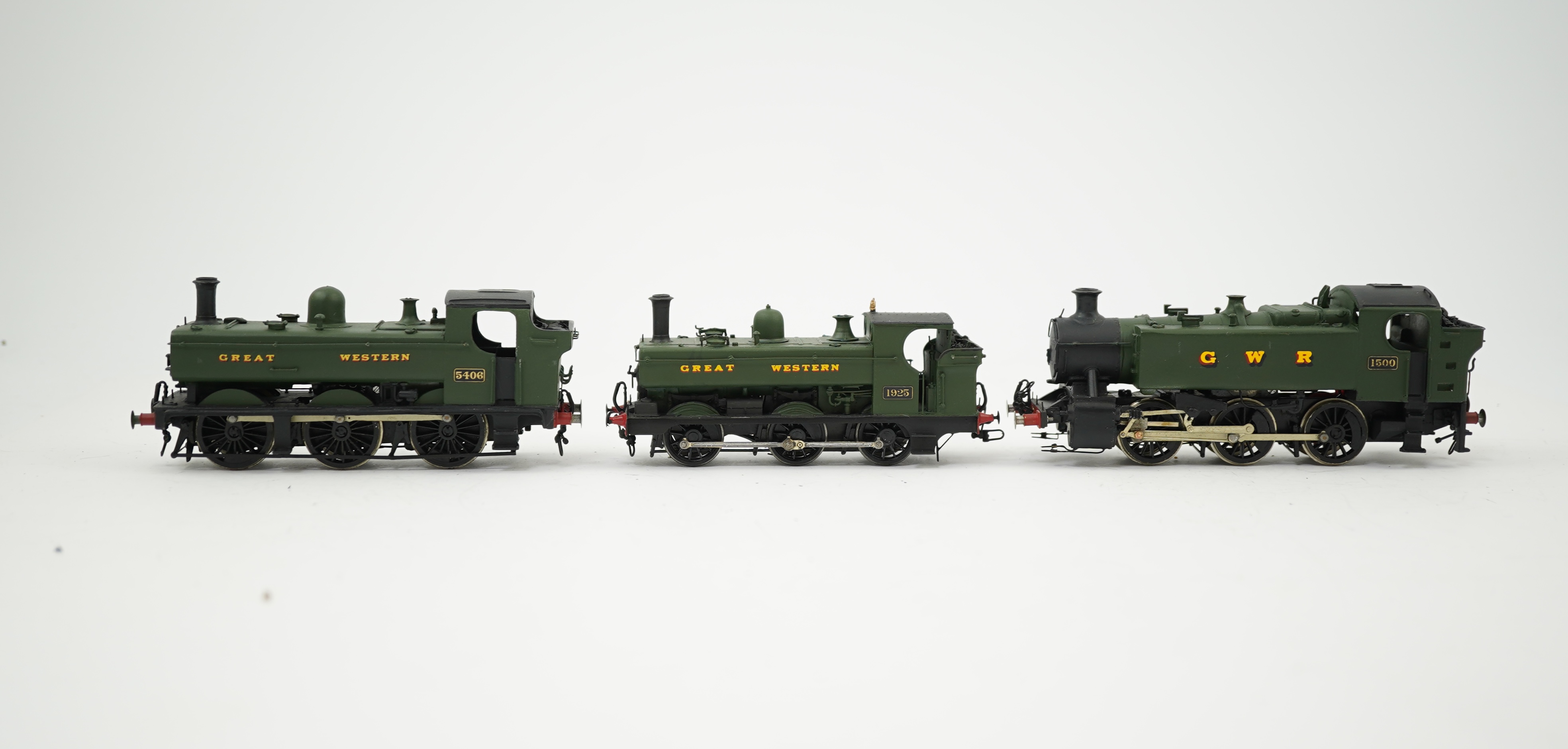 Three 00 gauge brass and white metal kit built GWR tank locomotives; a 15xx class 0-6-0T, 1500, together with an 54xx class 0-6-0PT, 5406, and a 19xx class 0-6-0PT, 1925, all constructed, painted and lined to a high stan